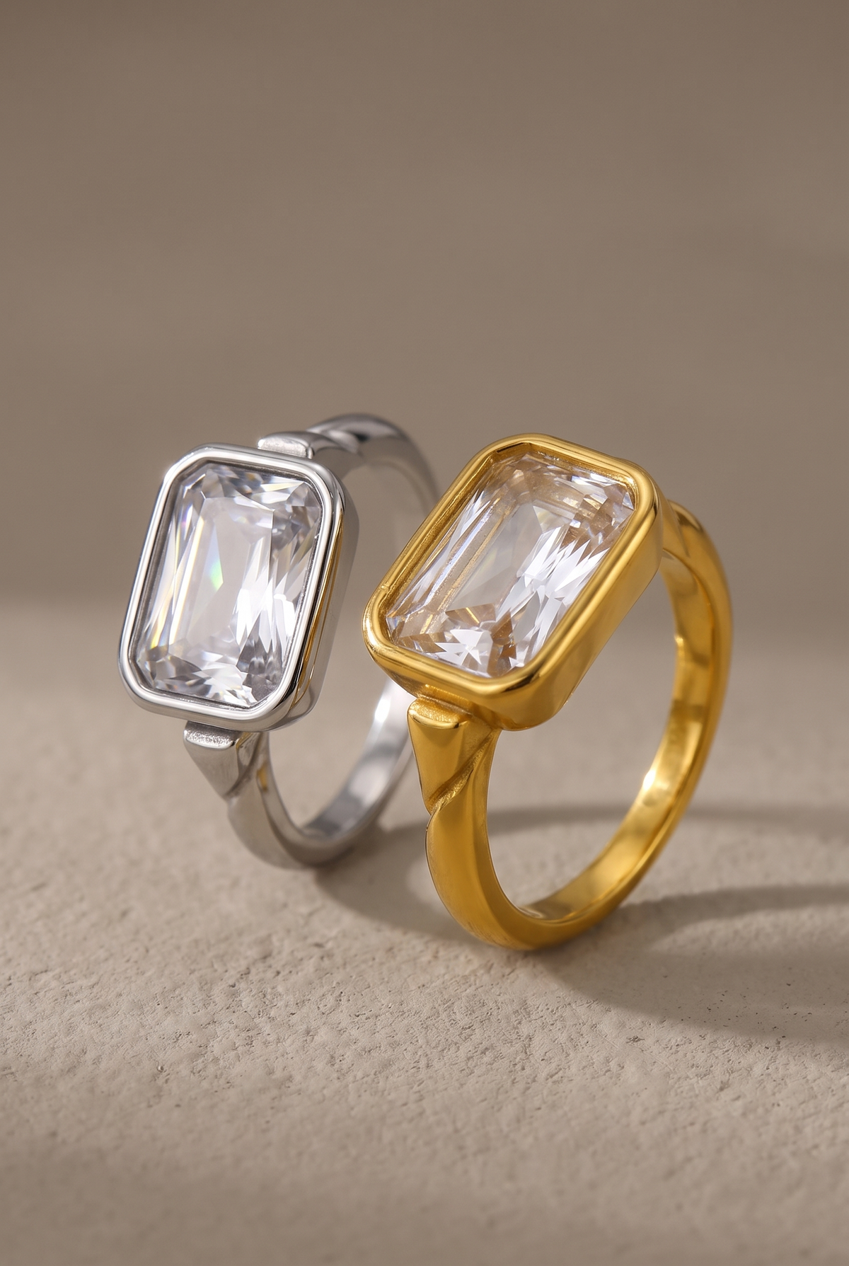 DropIQ emerald-cut crystal bezel ring in gold and silver